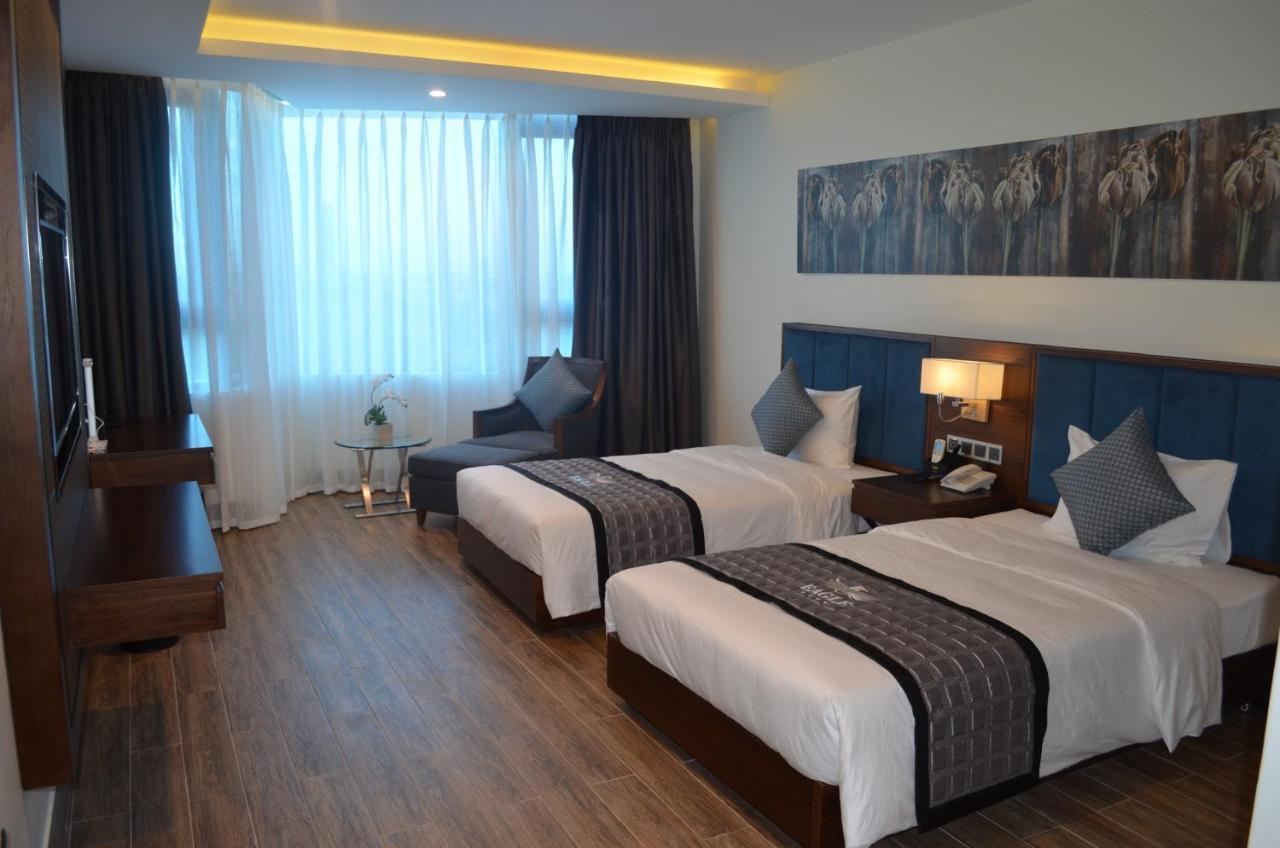 Eagle Hotel Dai Tiet Exterior photo